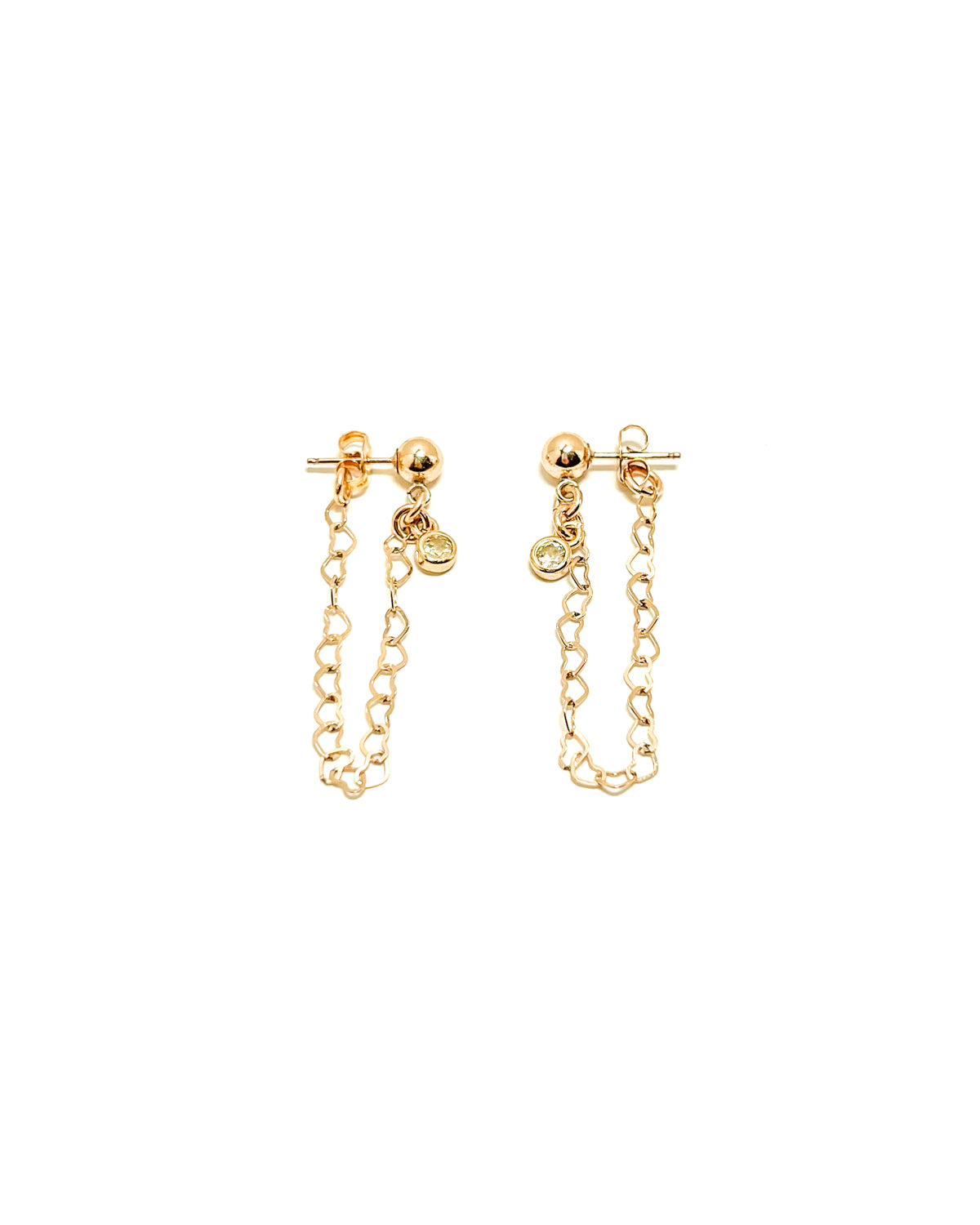 Gold ball stud earrings with a dainty heart chain and round bezel cubic zirconia drop.