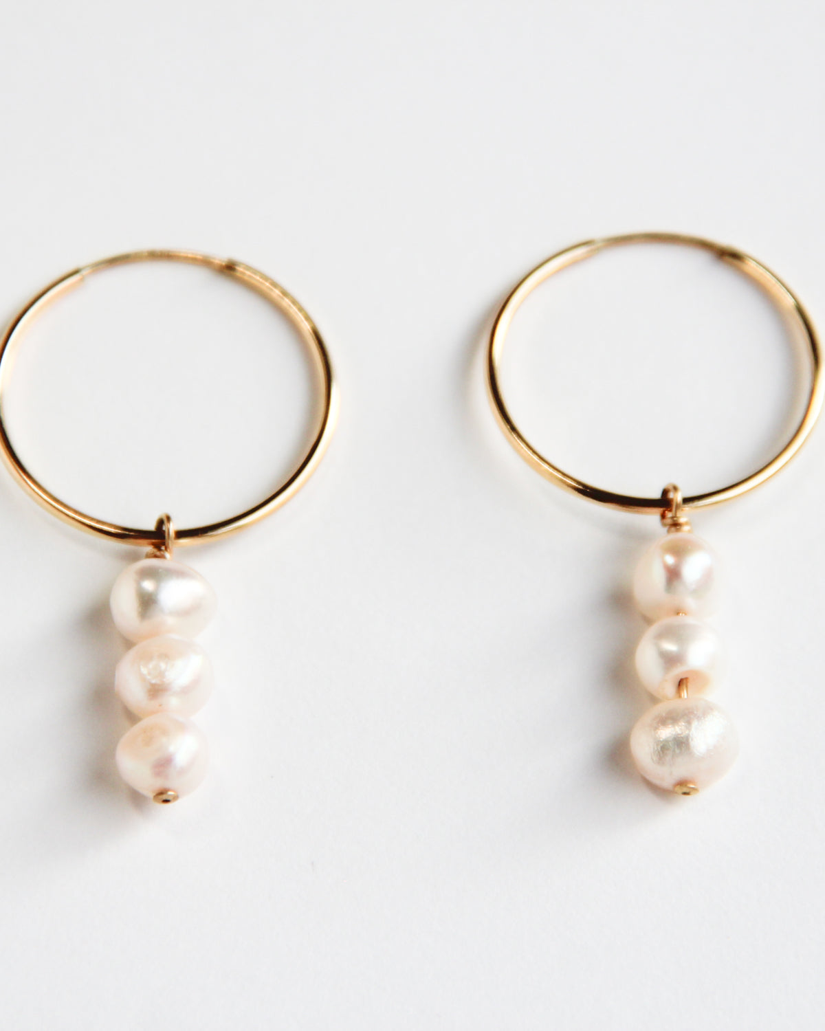 Gold-filled hoops with pearl drops